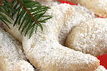 Kourabiedes with Almonds (Traditional Greek Christmas cookies with icing sugar)